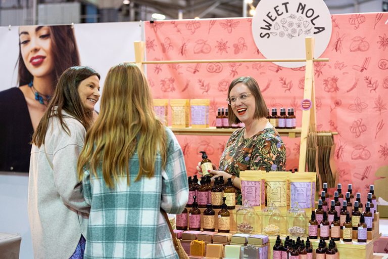 A woman sells wares at the Sweet Nola stall at Bowerbird