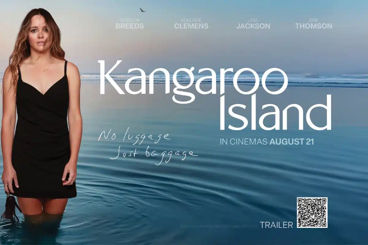 Movie poster for "Kangaroo Island," featuring a woman in a black dress against a scenic backdrop.