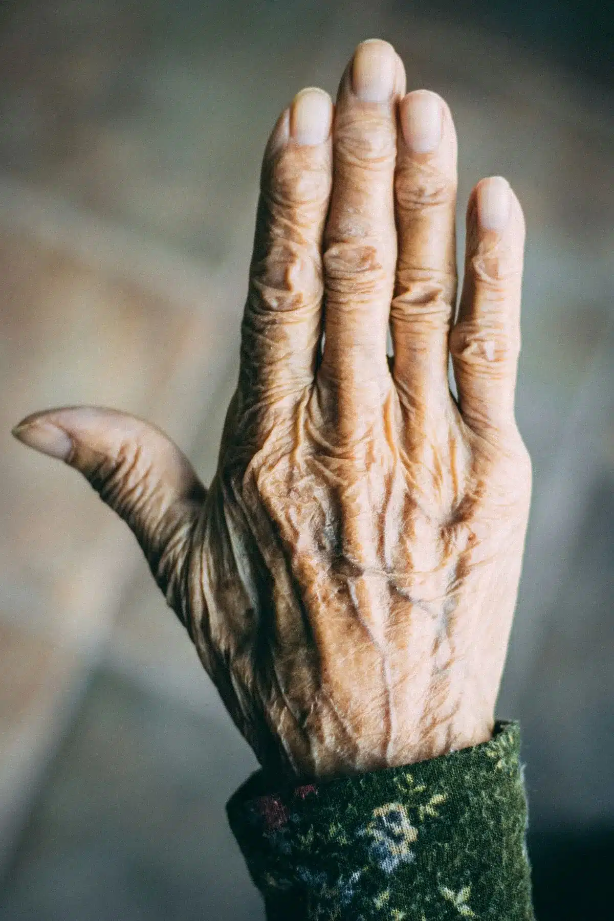 Wrinkled hands.
