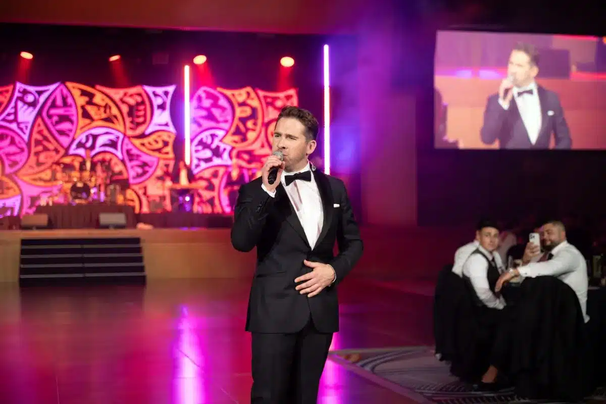 Hugh Sheridan on stage.