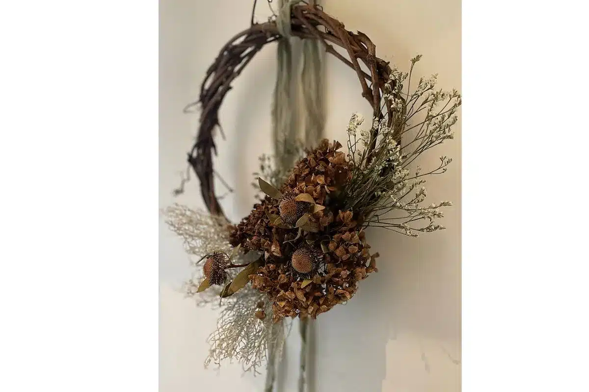 a decorative wreath hung on a door