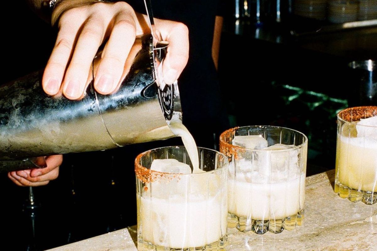 Cocktails being poured at Soda Bar, Adelaide South Australia.