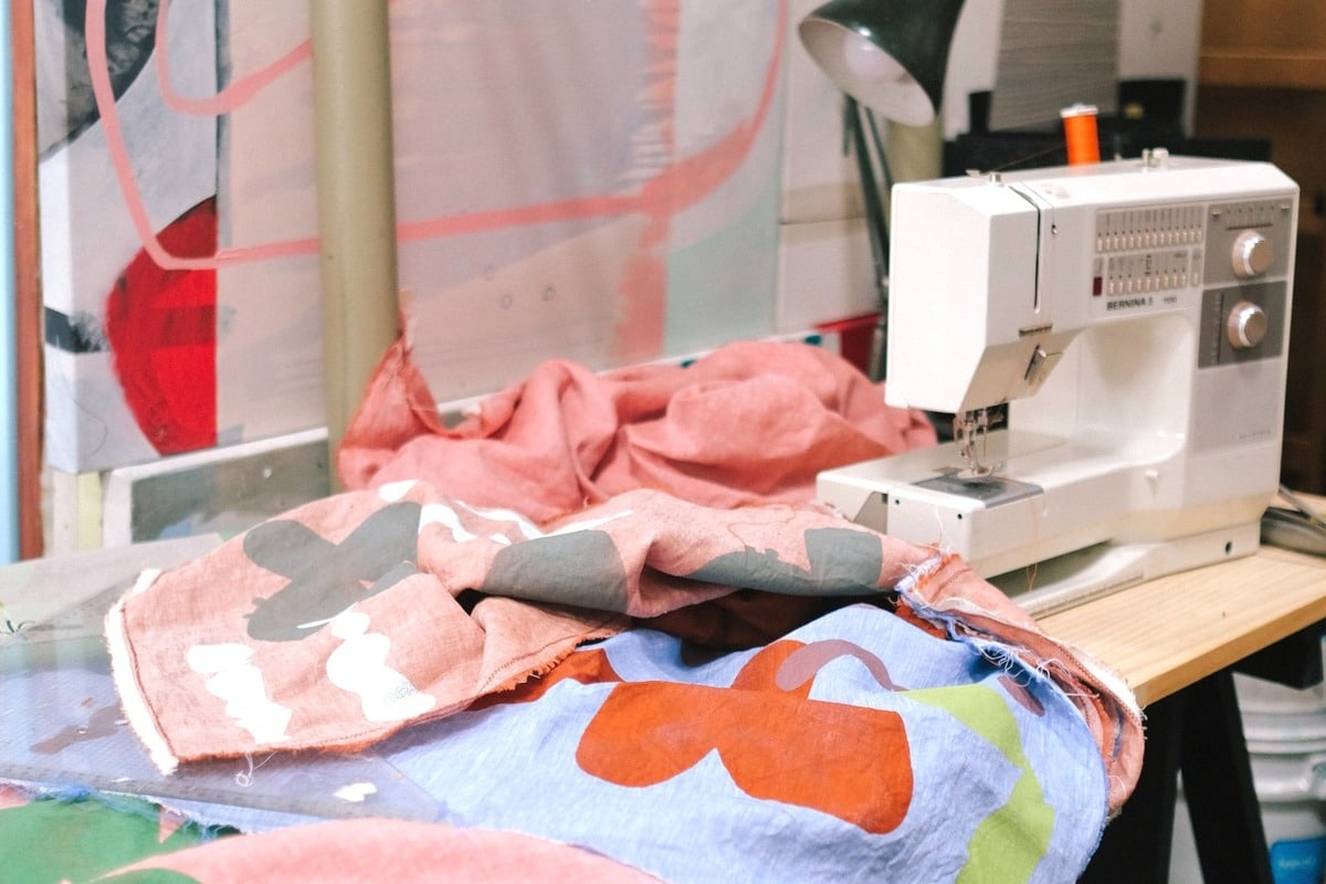 Sue Ninham artist's fabrics on sewing table.