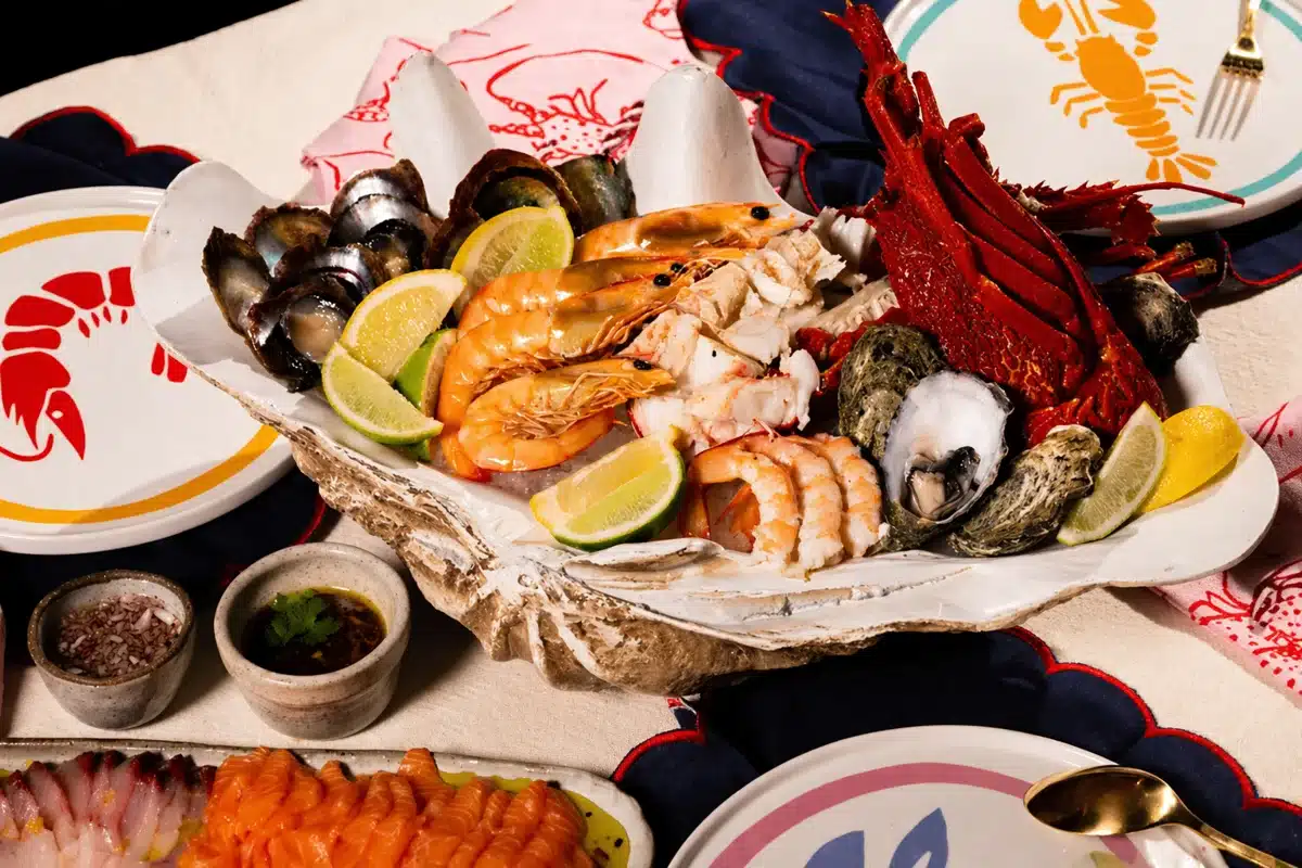 Adelaide Central Market Seafood Platter - an assortment of seafood displayed on colourful tableware.