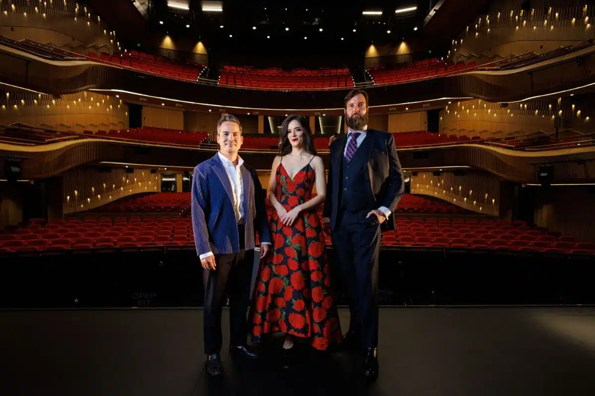 South Australian State Opera performers standing on stage in theatre.