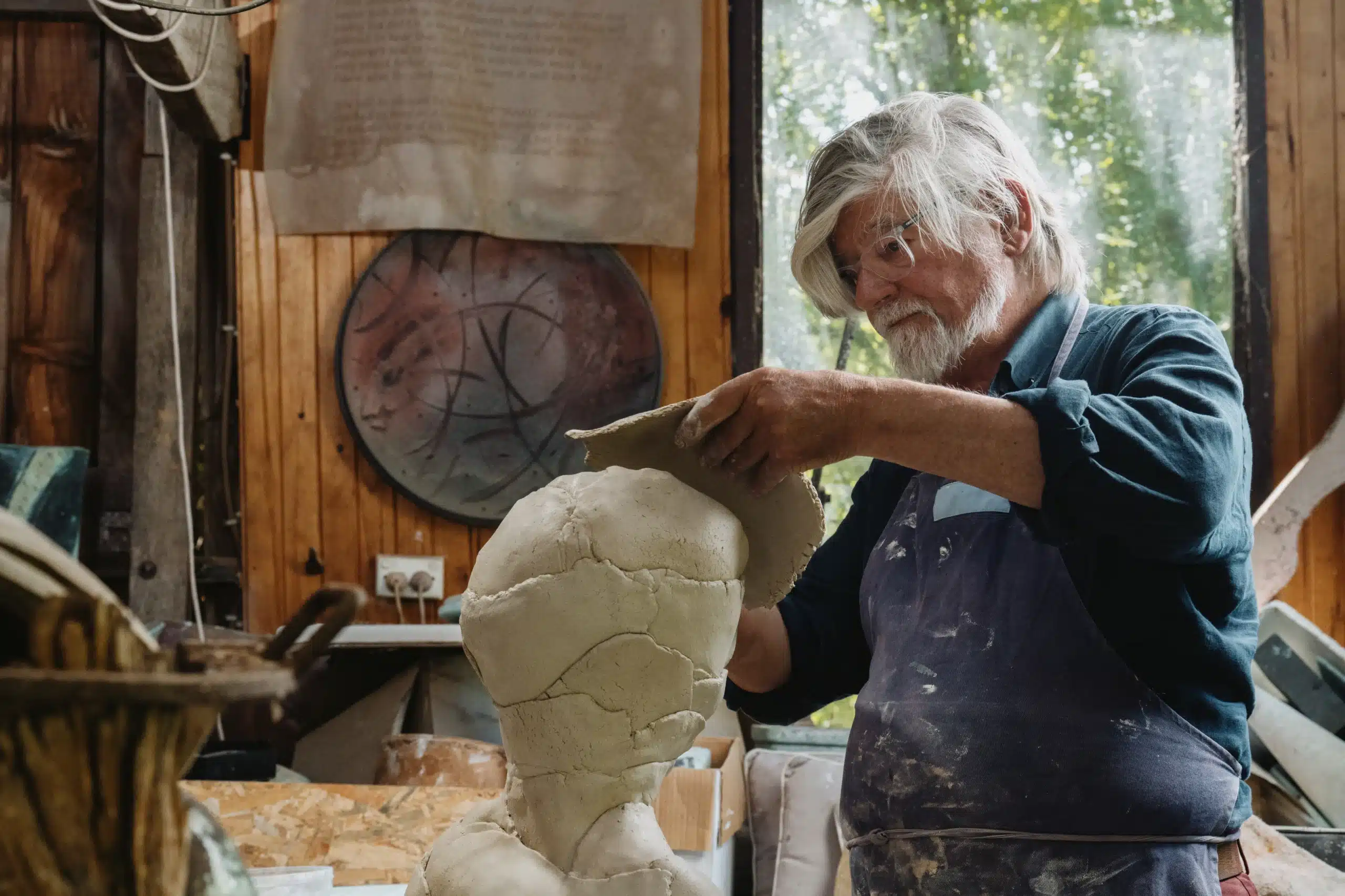 Ceramist and JamFactory Lifetime Honouree Jeff Mincham AM working in his studio for the Making Old New exhibition at David Roche Gallery. Photo credit: Connor Patterson Photography.