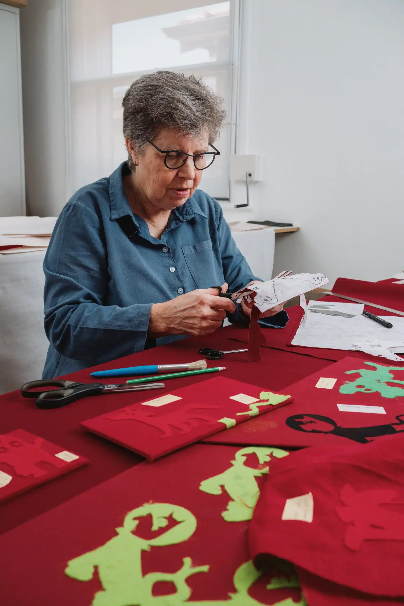 Artist Sue Lorraine working on her piece for the Making Old New exhibition at David Roche Gallery. Photo credit: Connor Patterson Photography.