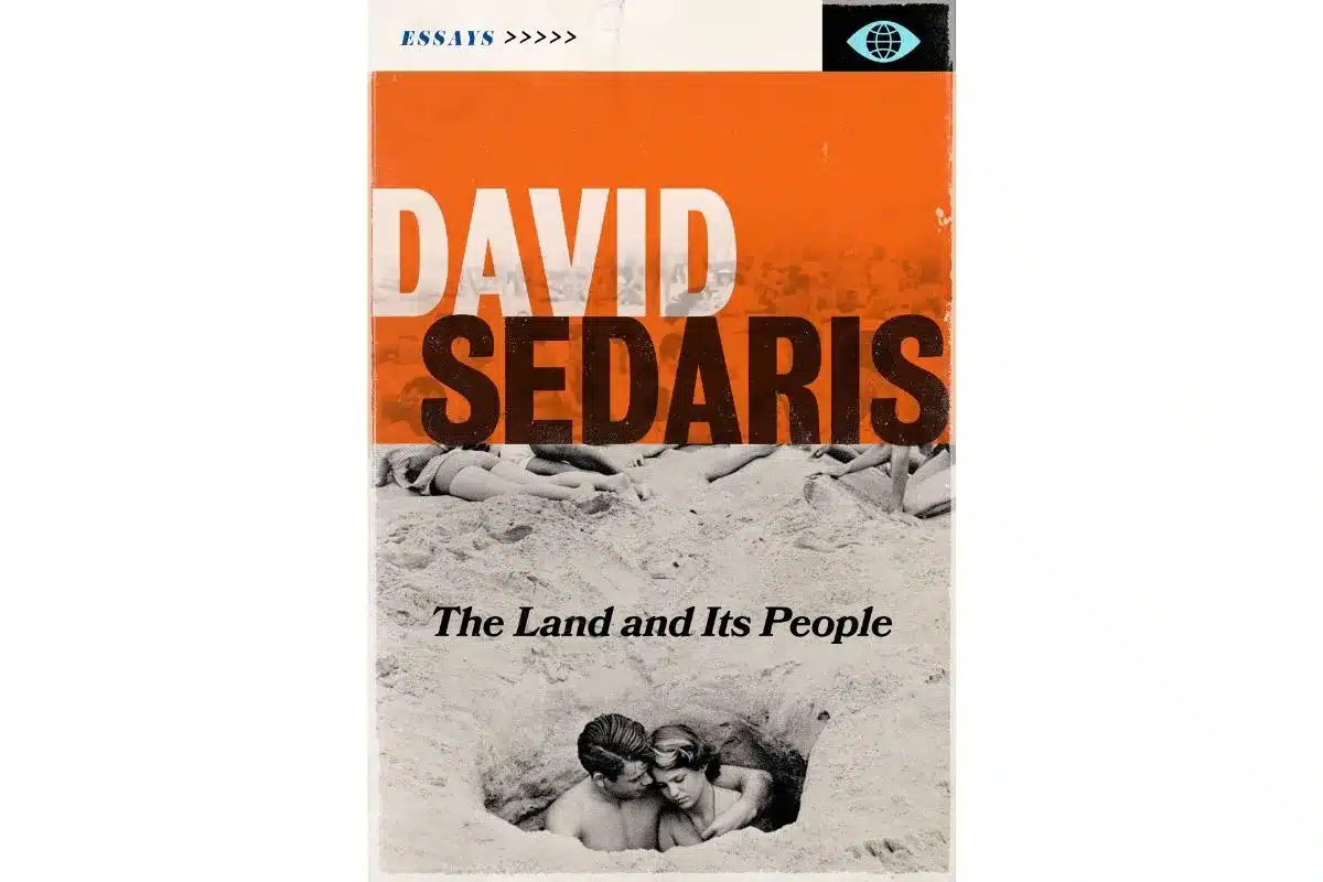 Book cover of The Land and Its People by David Sedaris, featuring bold orange and white typography over a vintage black-and-white photograph of two figures huddled together in a sandy hole at the beach.