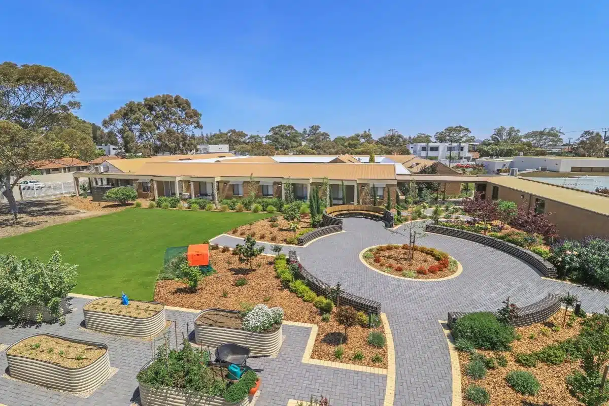 Aerial view of Crichton Court's landscaped gardens and raised community vegetable beds in Henley Beach