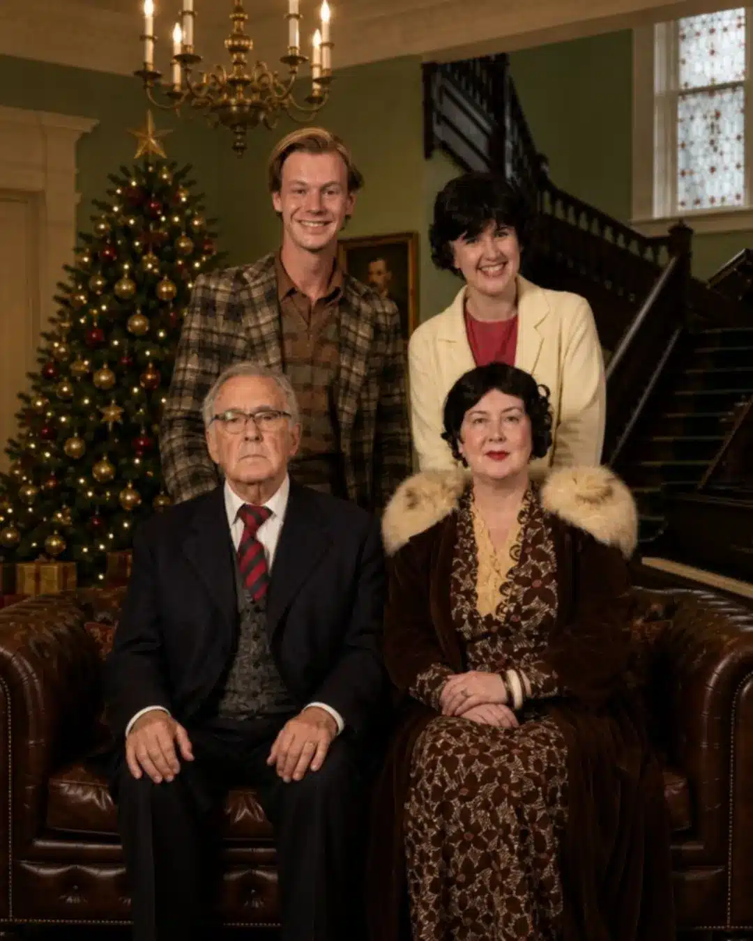 Cast members in 1930s costume in front of a Christmas tree for The Adelaide Repertory Theatre's The Man Who Came to Dinner