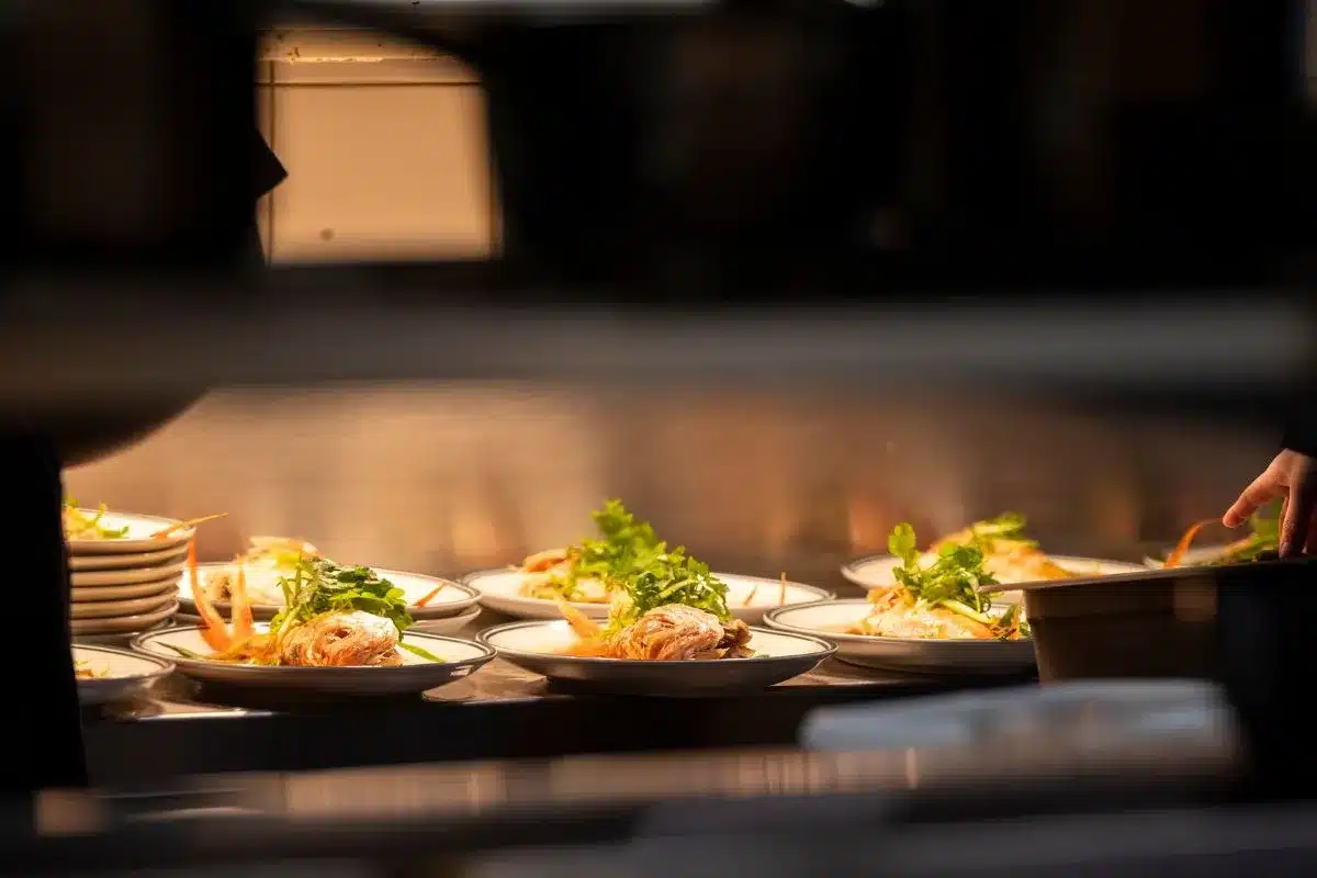 Restaurant meals plated and ready to be served.