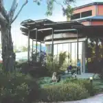Guests relaxing in the garden surrounds of UKARIA Cultural Centre in the Adelaide Hills