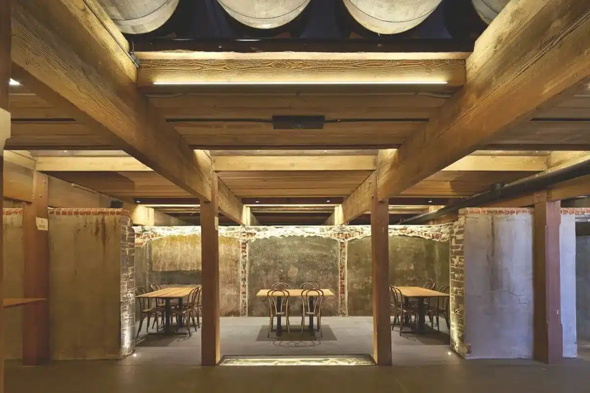 Wine barrels and exposed brick cellar dining space at Fino at Seppeltsfield, Barossa.