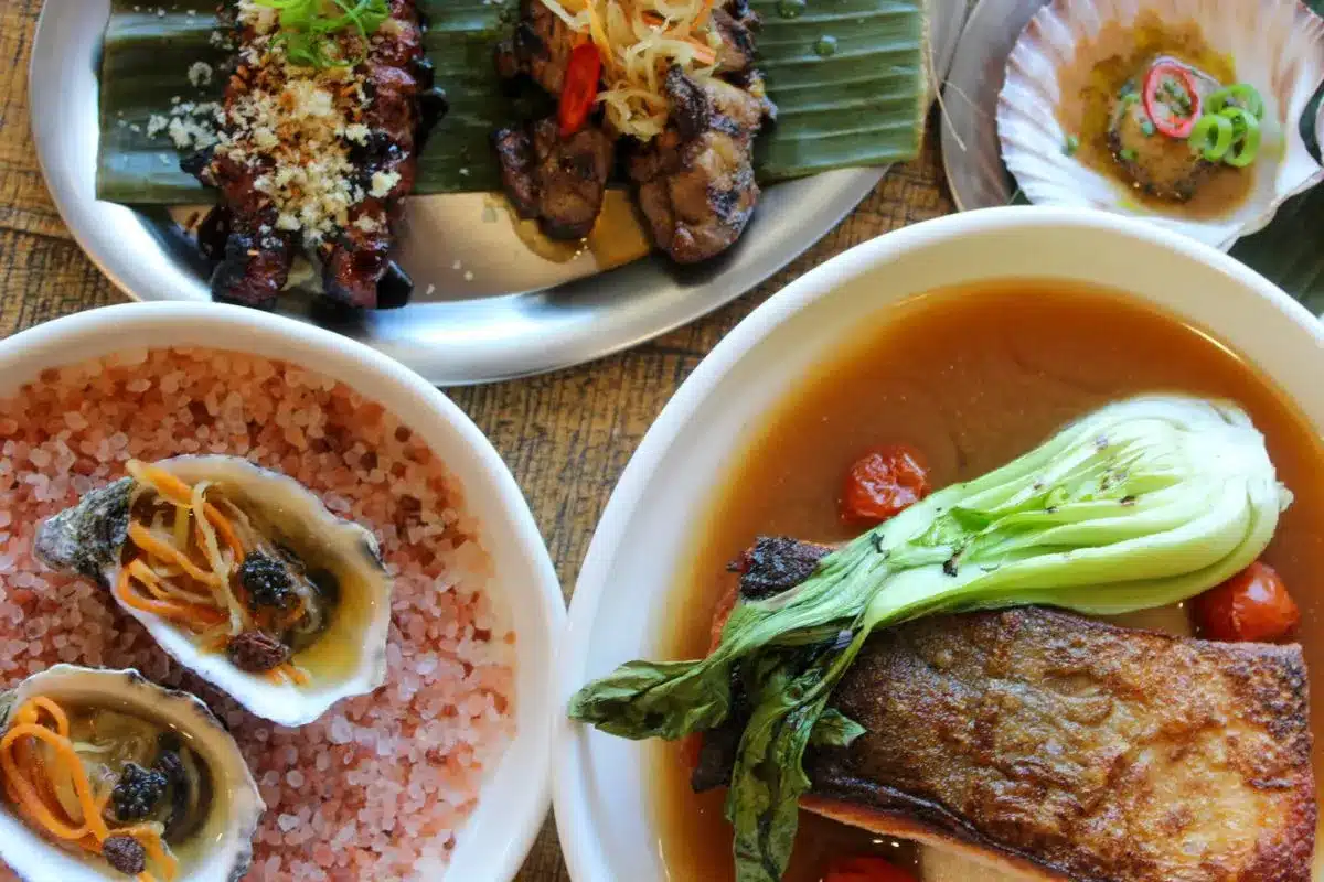 Mutya's restaurant colourful plates of food arrayed on a table.